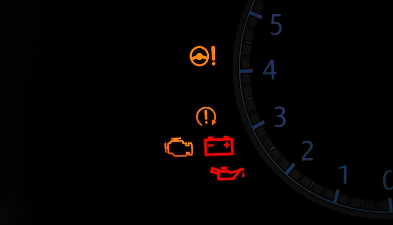 Dashboard Warning Lights Indicating Vehicle System Issues